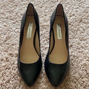 Women's black heels, never worn.